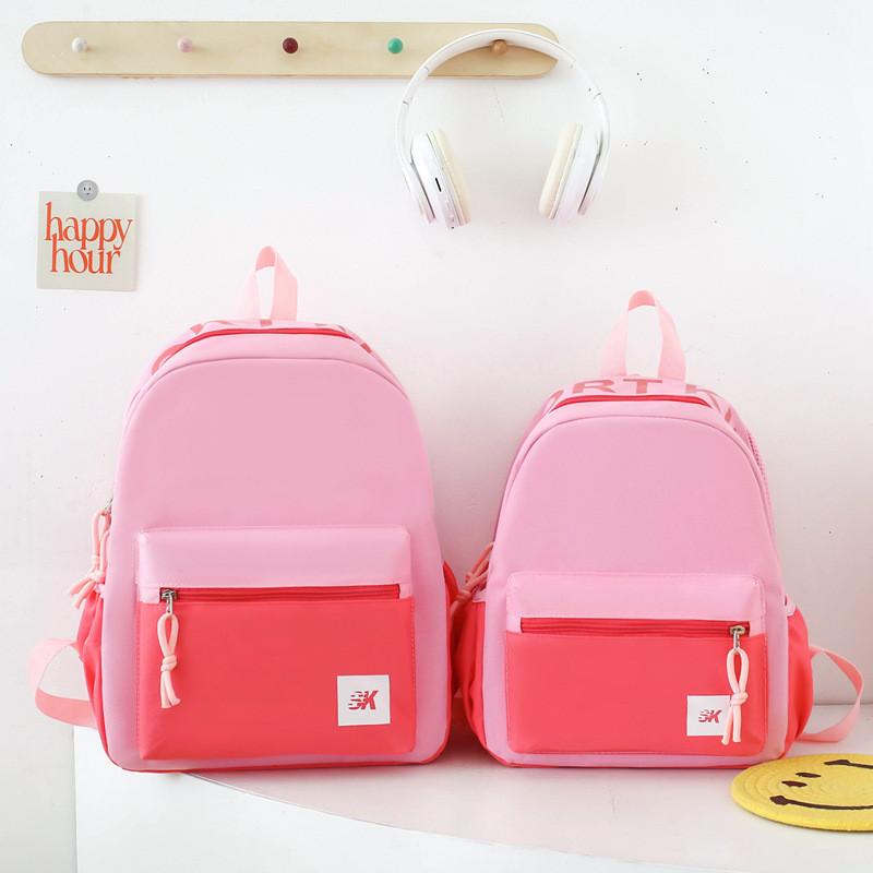 

Adorable Lightweight Nylon Children s Backpack Simple Colorblock Design For School рожевий