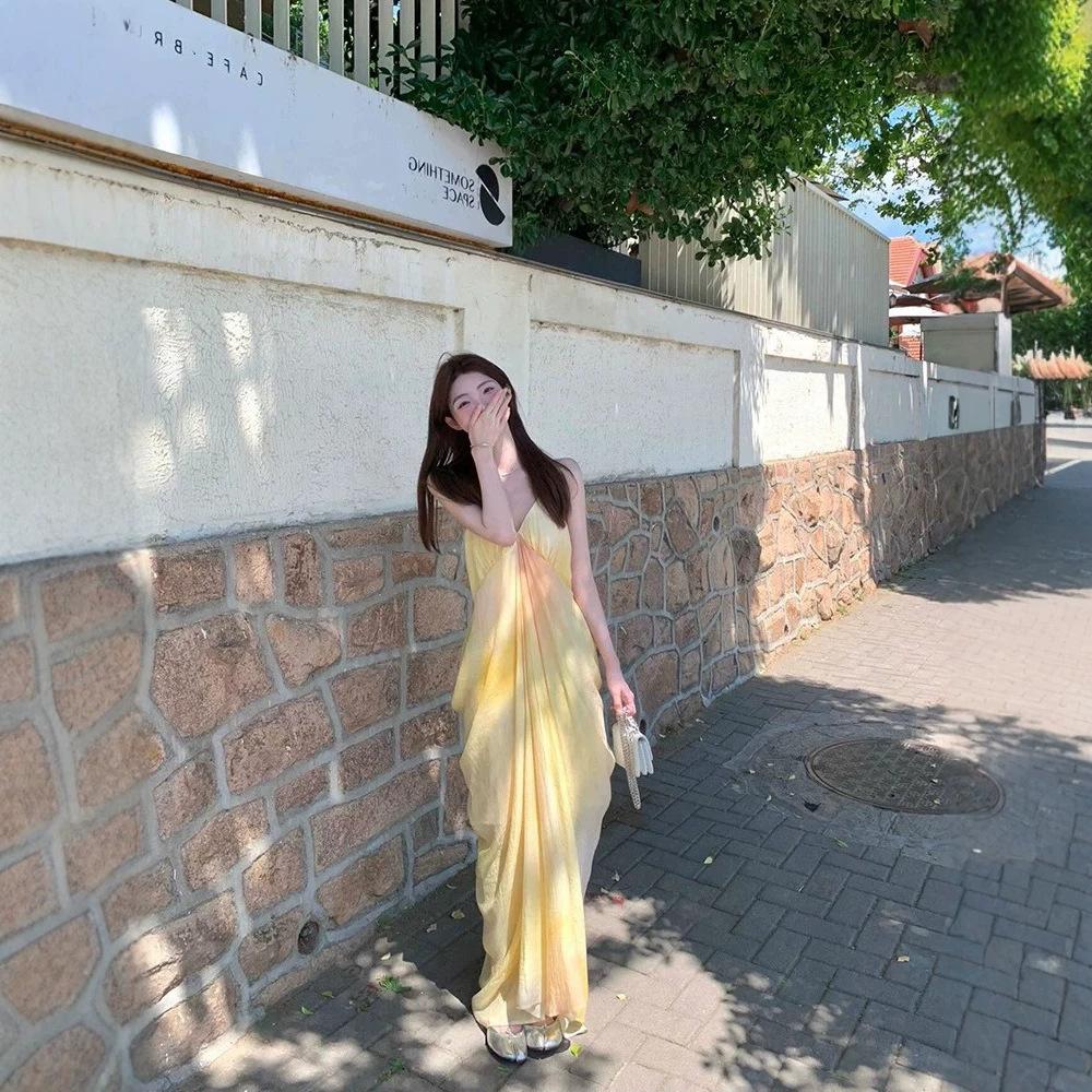 French fairy temperament seaside vacation dress pendant yellow smudge print v-neck suspender dress female summer