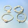 Four-piece ocean wind shell imitation pearl starfish beaded elastic bracelet summer beach vacation wind women's bracelet