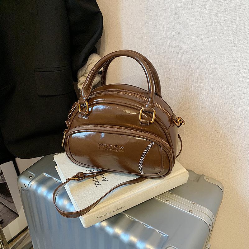 Niche Retro Pillow Bag Women's New High-end Sense Versatile Shoulder Messenger Bag Hand Carry Commuter Bag