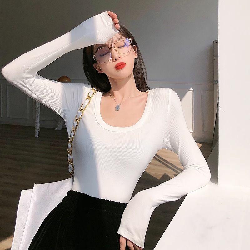 Maglietta nera aderente a maniche lunghe con scollo a U e taglio basso, da donna, autunno/inverno