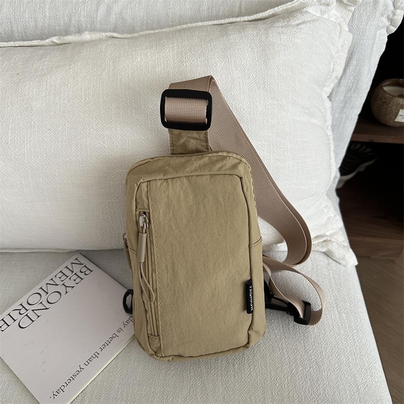 New sports go out light backpack messenger bag mobile phone bag portable fashion shoulder bag men's and women's bags