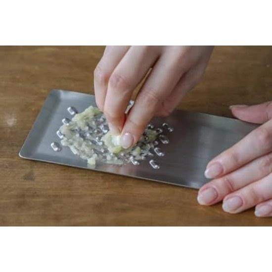 Tomita-style grater 2-piece set Light fluffy grated daikon Retains moisture concentrates flavor Stainless steel dishwasher safe