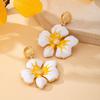 Hot Selling French Resort Style Yellow and White Enamel Flower Earrings Gold Texture Ball Light Luxury Earrings Suitable for Women
