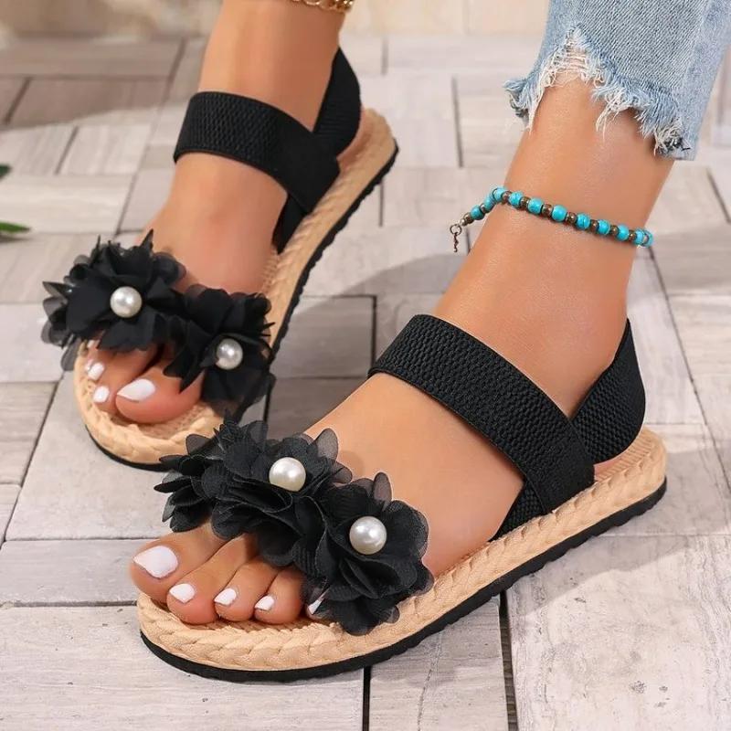 

Женские летние плоские сандалии 2025 Черные с круглым открытым носком, на резинке, с цветочным узором, удобные женские пляжные сандалии 43 чёрный