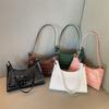 French niche bag women's 2026 new fashion solid color underarm bag texture portable shoulder baguette bag