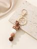 European & American Monogram Silicone and Wood Beads Tassel Keychain Bracelet