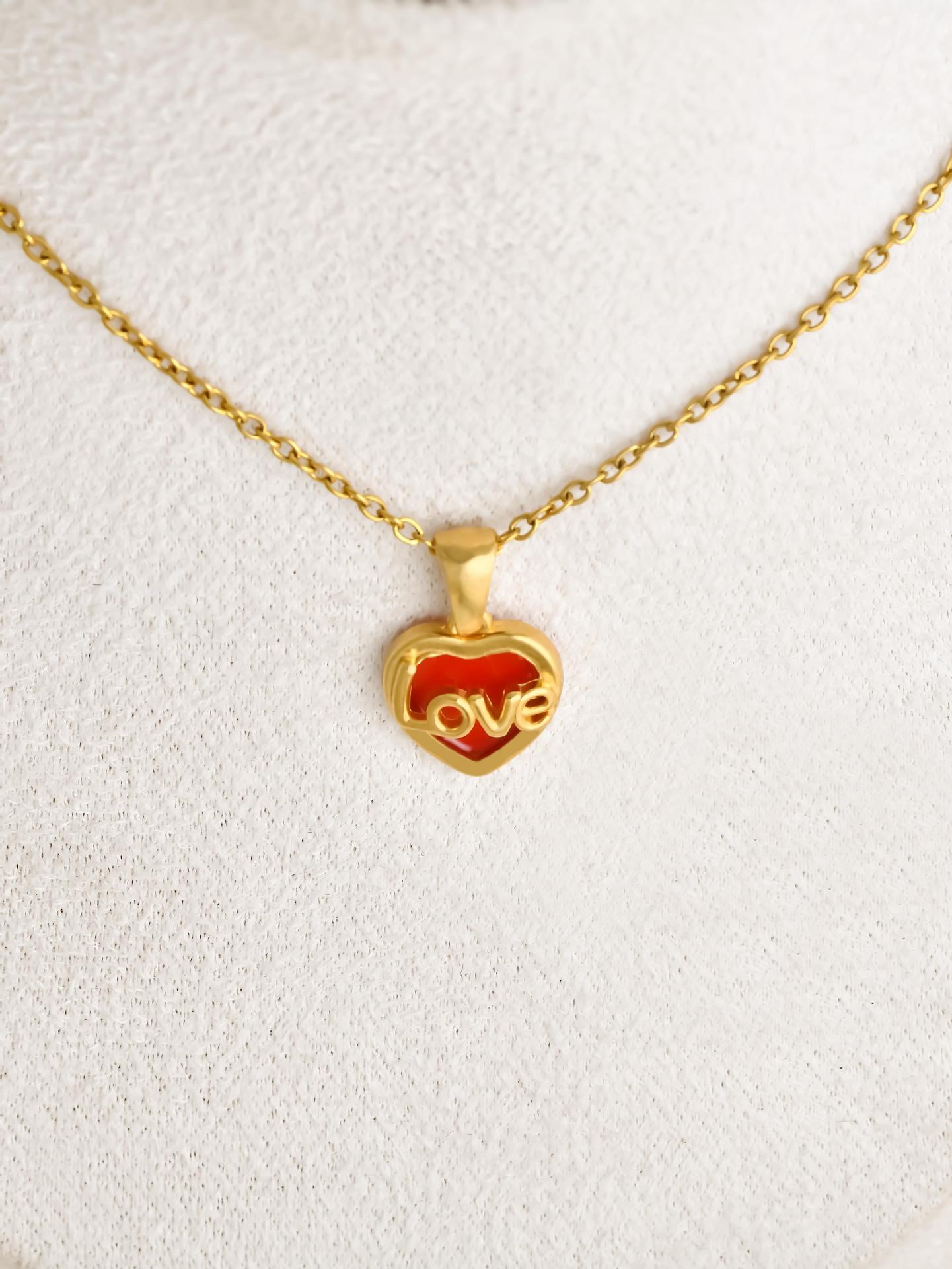 European and American Valentine s Day light luxury titanium steel love necklace, red pattern Love hollow pendant, stainless steel neck chain