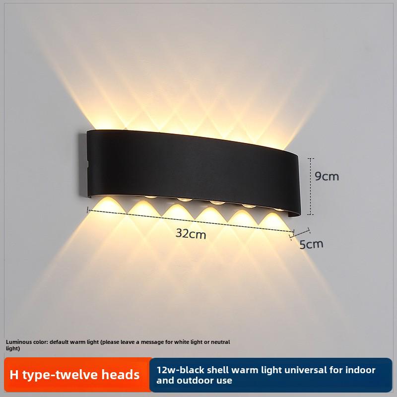 LED Outdoor Four-Leaf Clover Wall Light - Up and Down Beam Decoration for Garden and Exterior Walls.
