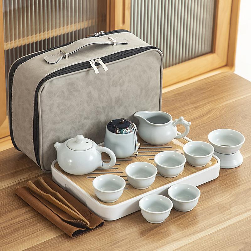 Travel ceramic Kung Fu tea set, tea tray, a full set of portable storage bags, practical business gifts for customers