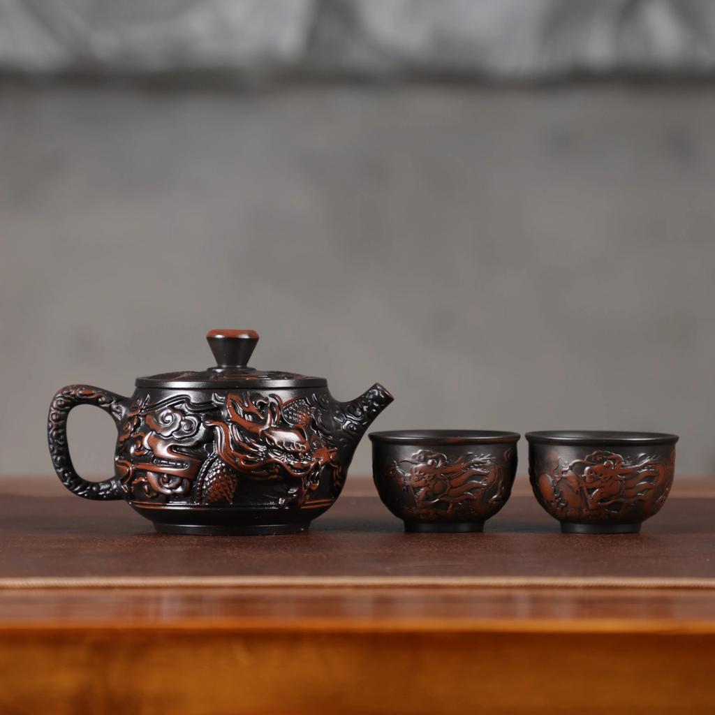 Teapot purple pottery material large capacity pure hand-carved retro relief desktop ornament household Chinese gift rotary pot