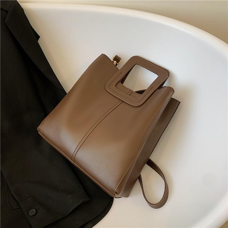 

Niche design women s bag spring and summer retro portable tote bag large capacity shoulder messenger bag темно-коричневого