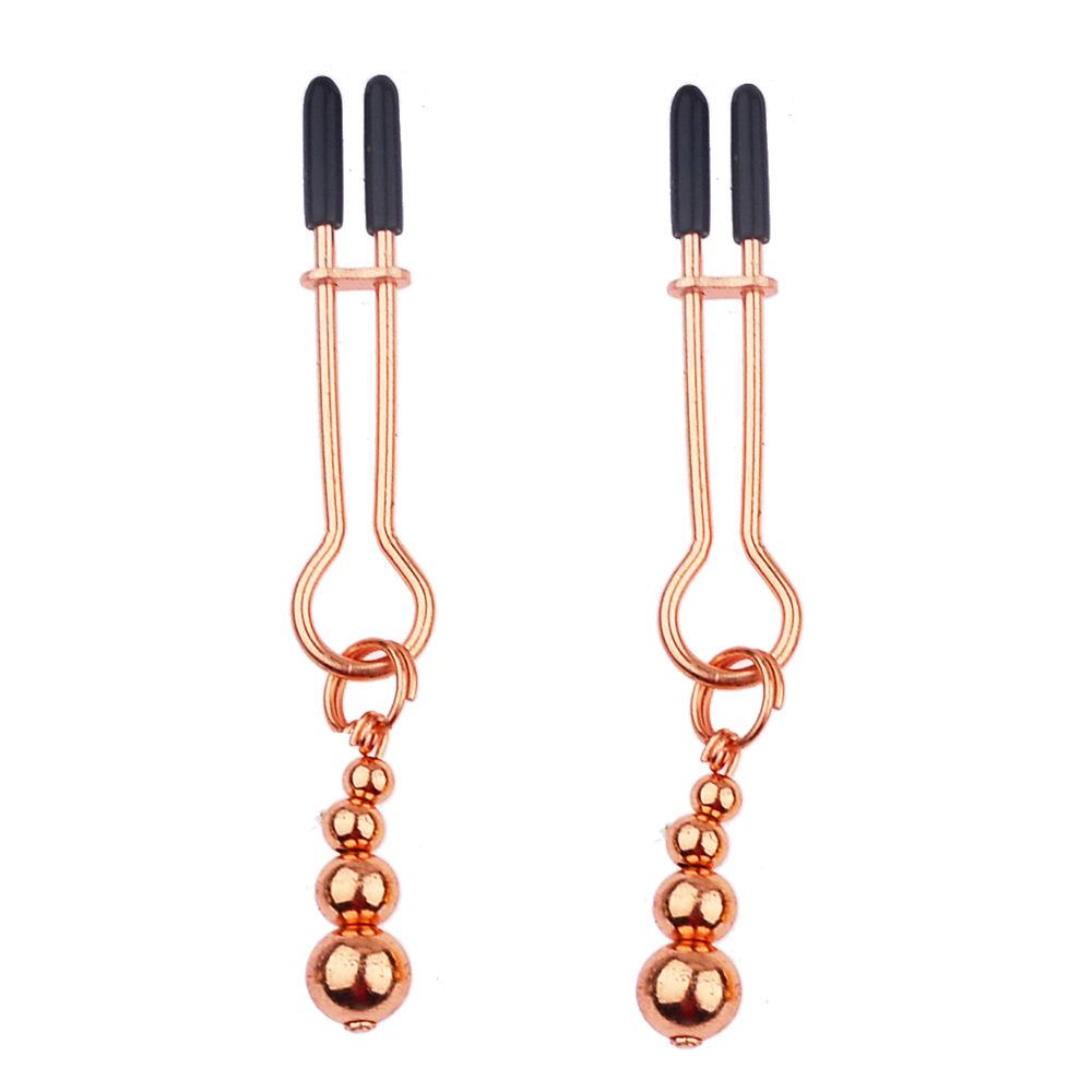 Adjustable Tension Stainless Steel Nipple Clamps with Non Slip Tips and Metal Beaded Dangle Design for Personal Use