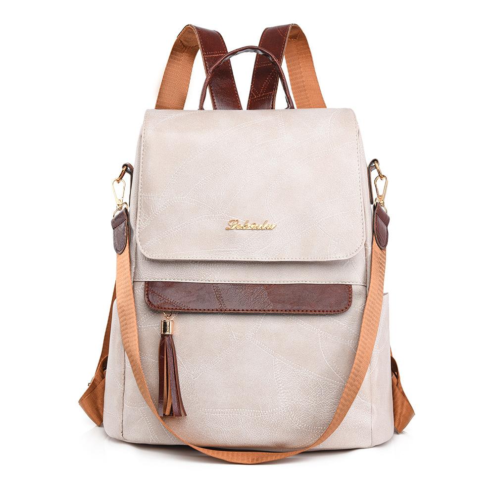 Женский многофункциональный рюкзак из мягкой кожи с кисточками в стиле ретро — фото 21