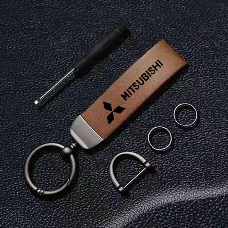 Autoschlüsselanhänger Luxus Echter Leder Schlüsselanhänger für Mitsubishi Pajero Sport Eclipse Cross L200 Colt Delica Ralliart Triton Auto