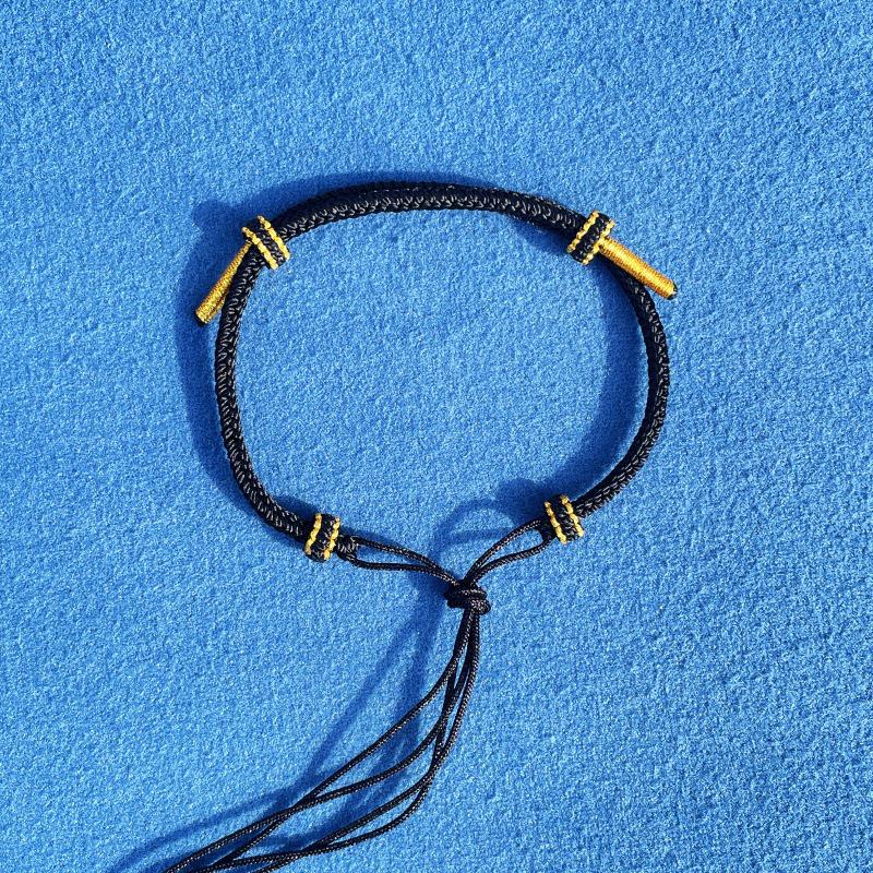 

Регульований Червоний Рукоплетенний Мотузок DIY з Захисною Пряжкою та Переносною Намистиною для Чоловіків та Жінок чорний