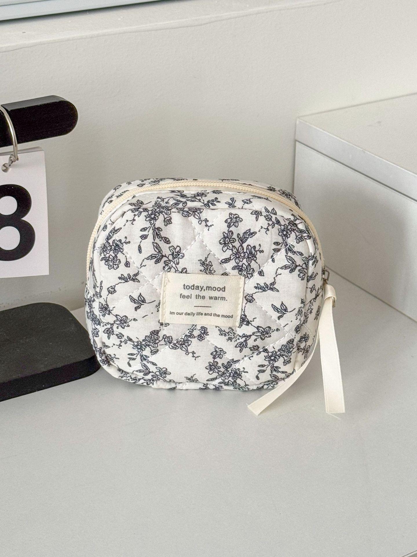 

French Black & White Floral Menstrual Pad Bag - Portable, Stylish Storage for Students