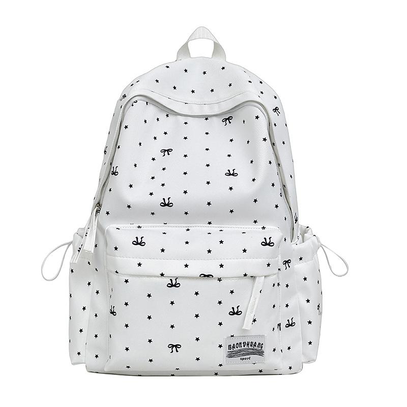 Schoolbag new ins style simple large capacity backpack polka dot bow design sense backpack versatile niche schoolbag women
