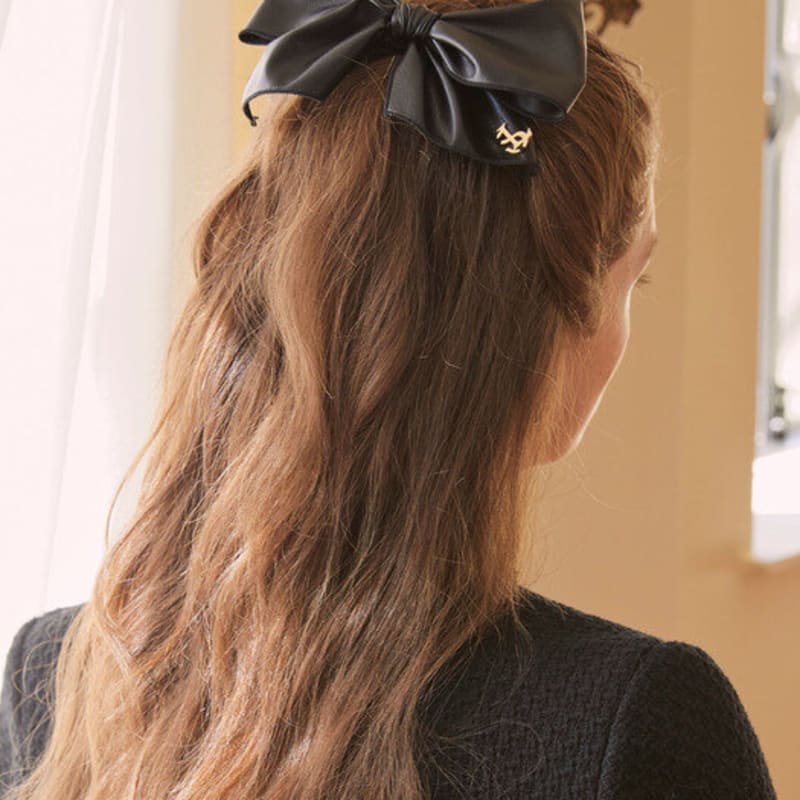 

of Lavishe Fake Leather Bold Bow Pin Black