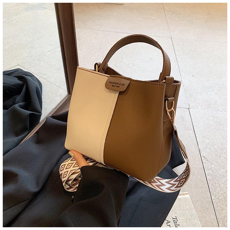 This year's popular retro niche color scheme portable bucket bag women 2025 new commuter shoulder messenger bag