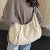 Japanese pleated large-capacity solid-color messenger bag female commuter nylon cloth dumpling bag student class leisure shoulder bag