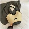 Large capacity beach woven bag women's 2025 new spring and summer niche design single shoulder commuter straw woven tote bag