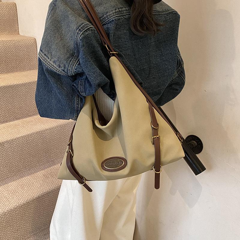 Korean version of multi-functional commuter backpack autumn and winter new lazy wind large-capacity tote bag single shoulder oblique span bag