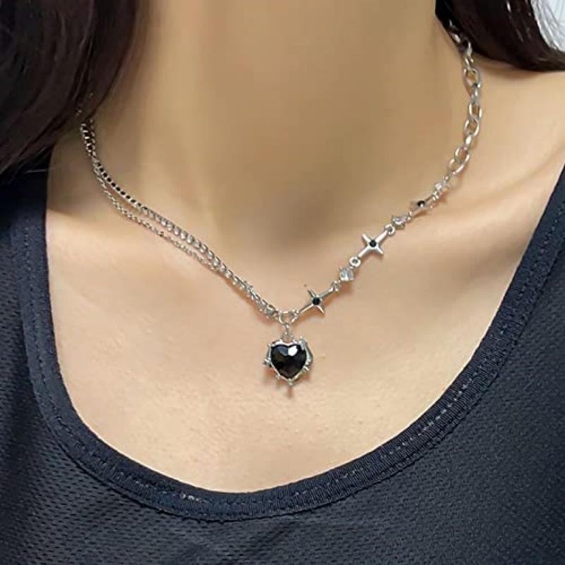 

A single-piece women s black heart and star necklace, featuring a minimalist, understated luxury style with diamond and crystal black&Other