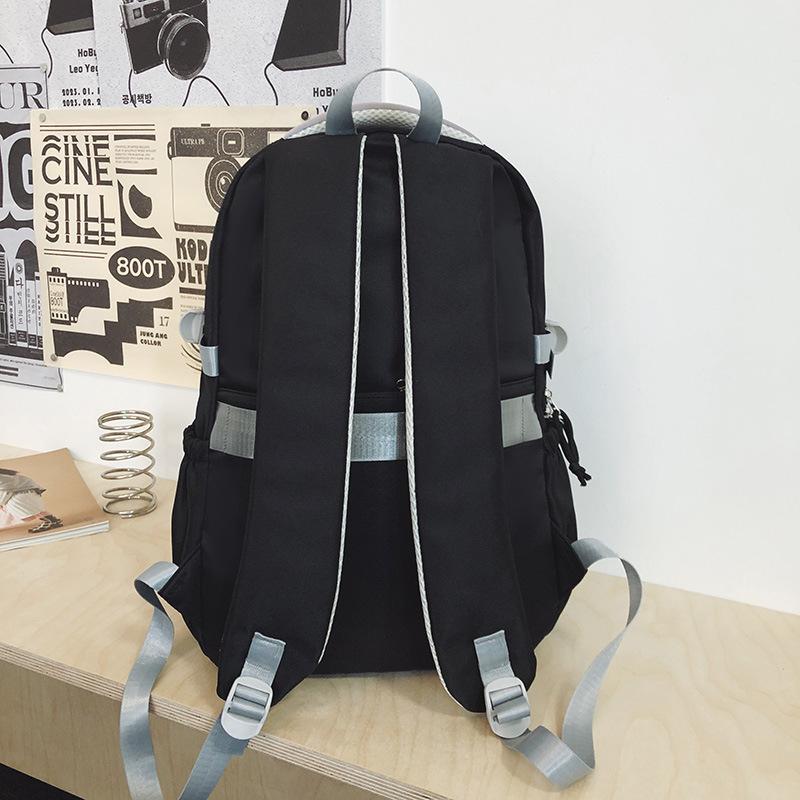 Winter New Contrasting Color Backpack Large Capacity Lightweight Fashion Burden Reduction Versatile School Bag Design Sense Student Backpack