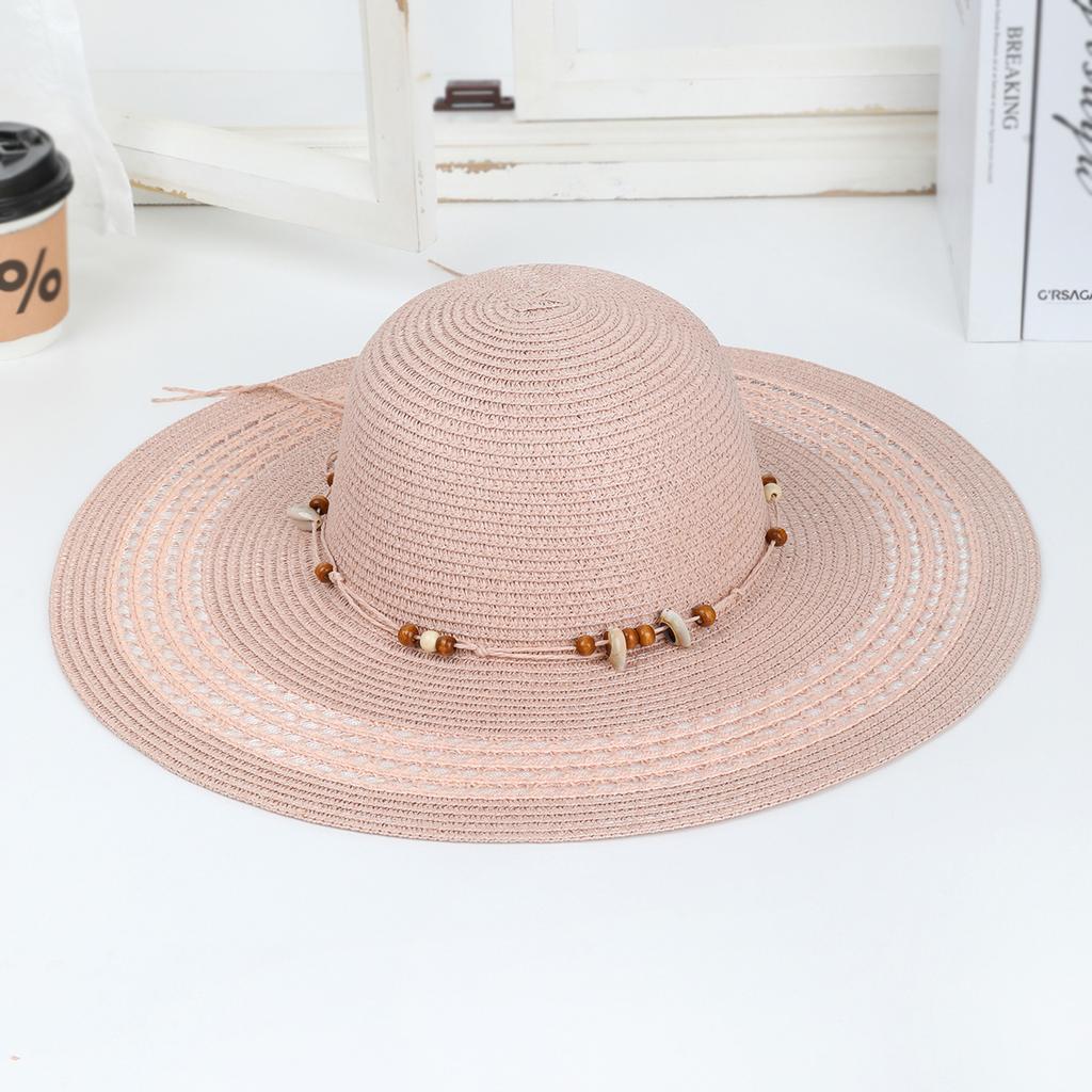 New Spring and Summer Fashion Strap Hollow Straw Hat Outdoor Casual Wind Hand-woven Sun Hat Women's Seaside Beach Hat