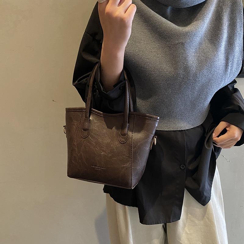 Premium tas dames lente nieuw forensen okseltas modieus eenvoudig niche design schouder messenger tas