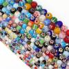 Bunte runde Lampwork-Perlen mit Millefiori-Muster für DIY-Handarmbänder
