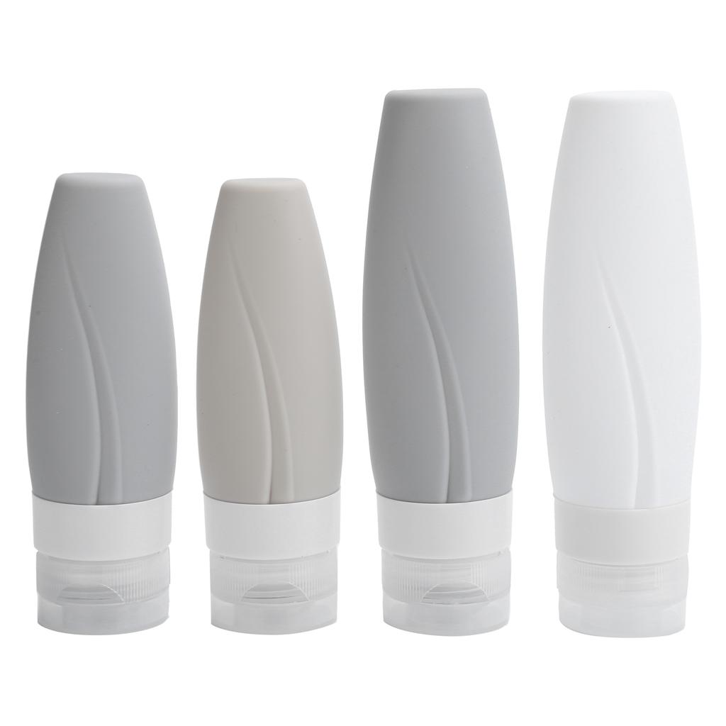 Set di 4 Flaconi Vuoti da Viaggio in Silicone Anti-perdita per Shampoo, Bagnoschiuma, Liquidi
