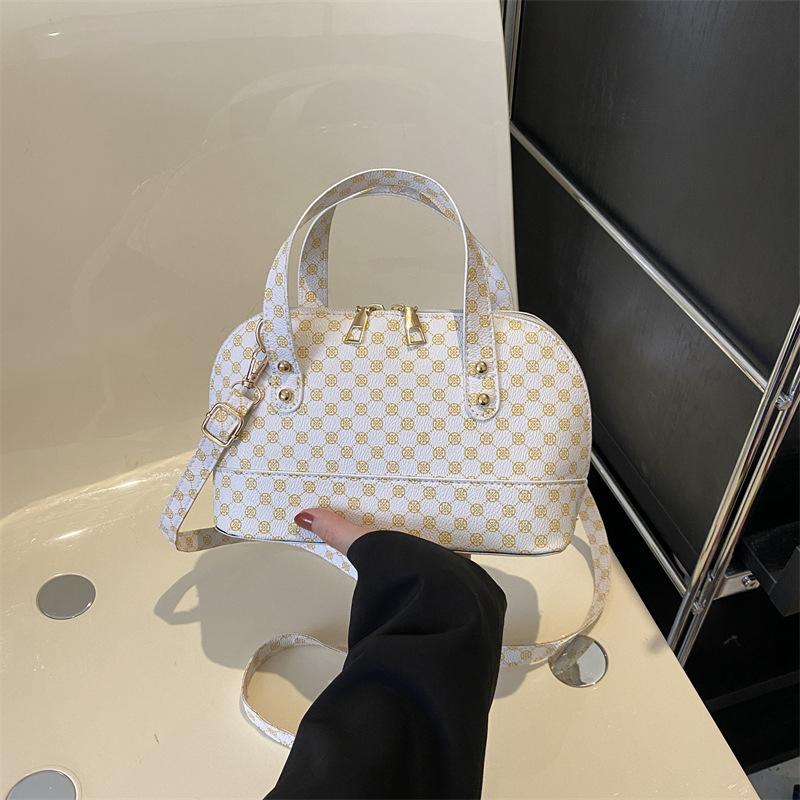 

Корейська сумка в черепашці, жіноча сумка 2024, весна, новий тренд, повсякденна портативна сумка через плече, модна сумка-месенджер в іноземному стилі off білий колір