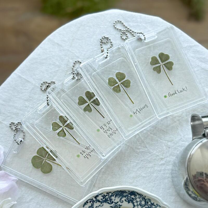 Fresh four-leaf clover coated keychain lettering clover season 2 1. Stationery X
