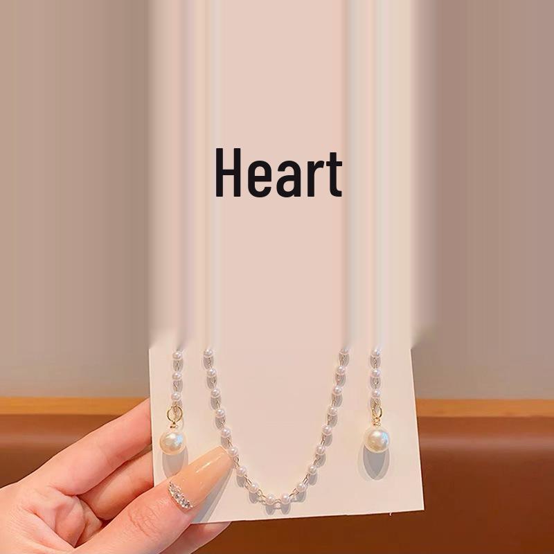 Dětská červená novoroční mašle do vlasů pro malou princeznu se střapci a perlami - Dívčí sváteční vlasový doplněk