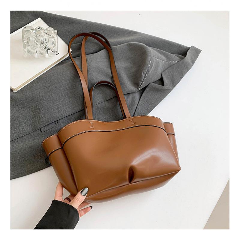 Frühjahr 2025 neue Damen Tasche Retro tragbare Umhängetasche vielseitige Kinder- und Muttertasche Arbeitstasche für Pendler