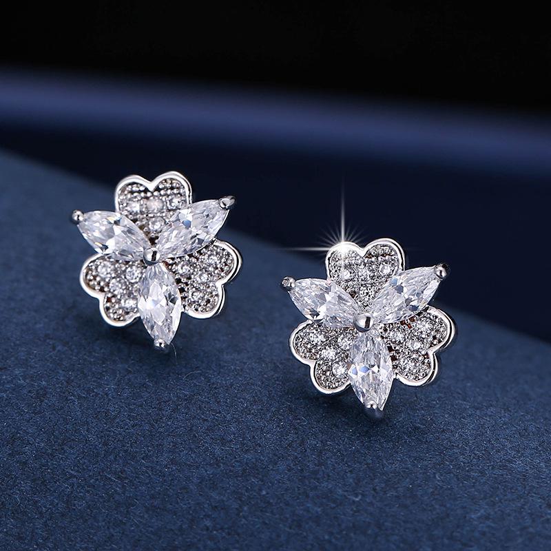 Elegant Rhinestone Copper Stud Earrings for Women - Stylish European and American-Inspired Ear Jewelry.