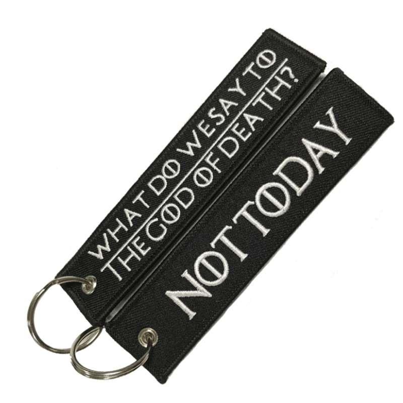 Entfernen Sie den Schlüsselanhänger „WAS DO WE SAY TO THE GOD OF DEATH“ vor dem Flug