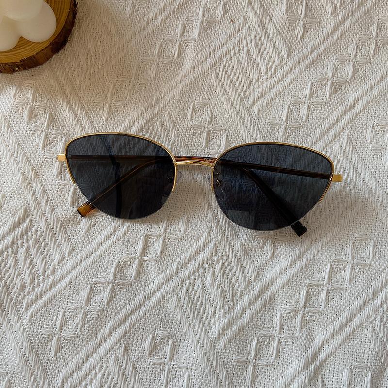 Retro cat s eye multilateral half-frame metal sunglasses, men s and women s high-end street photography, simple and elegant sunglasses
