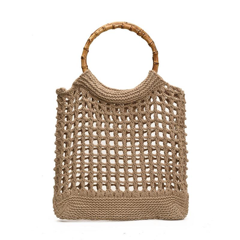 Hand carry woven bag women's Korean version ins fashion simple casual straw bag 2025 niche high-end hollow women's bag