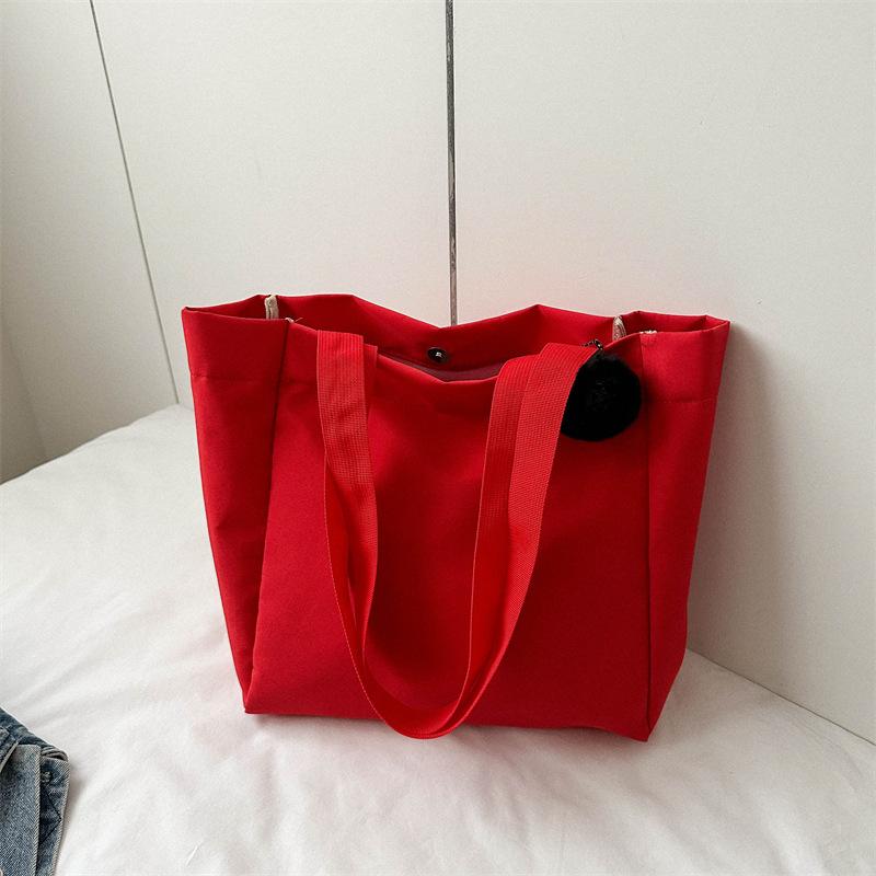 Bag women's new solid color large-capacity canvas shoulder bag simple commuter student tote bag shopping bag tide