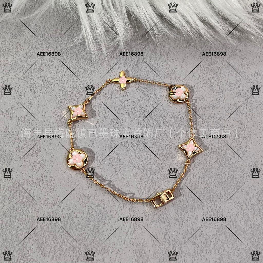 Luksusowa bransoletka damska ze srebra próby 925, wysadzana diamentami, z białą masą perłową i motywem czterolistnej koniczyny, z 18-karatowego różowego złota