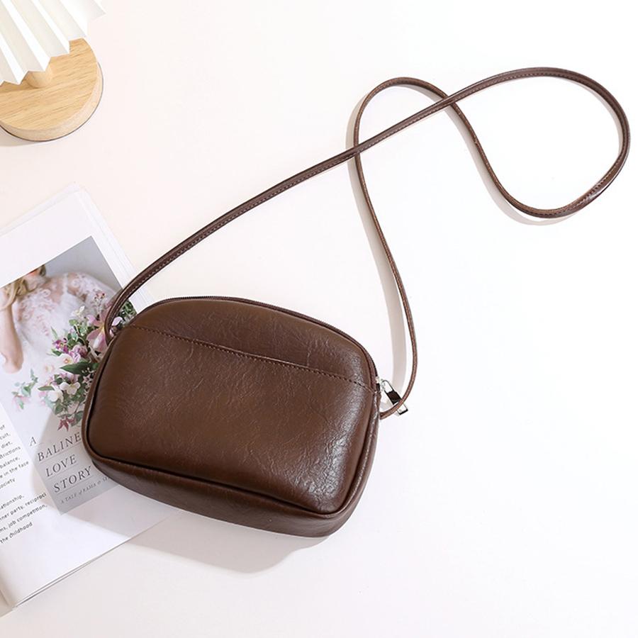 Retro women's simple soft pu leather small round bag solid color new style zip single-shoulder crossbody small bag daily handbag