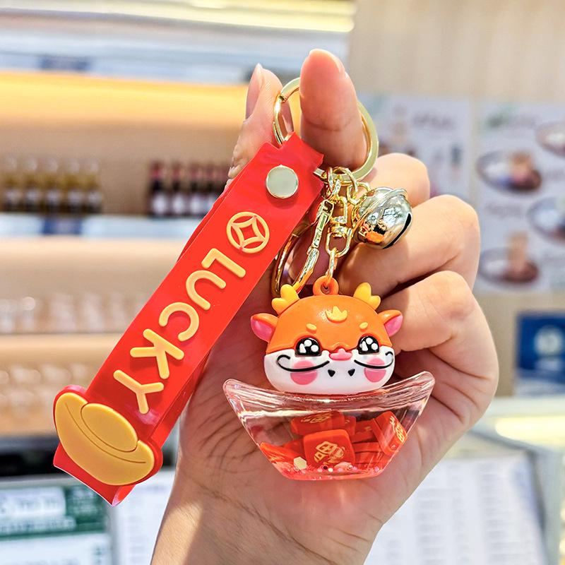 Akrylový přívěsek na klíče s tekutým pískem a obsahem oleje - Perfektní malý dárek na tašku nebo do auta.