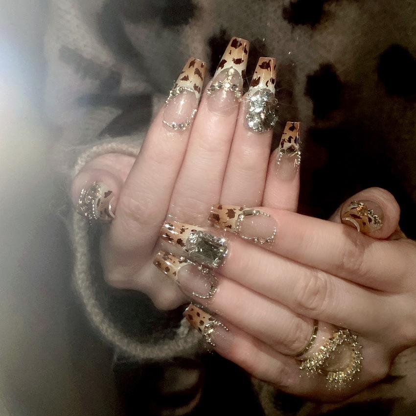

24Pcs Autumn Leopard Print Press On Nails, French Tips with Shiny Large Crystal Rhinestones United States