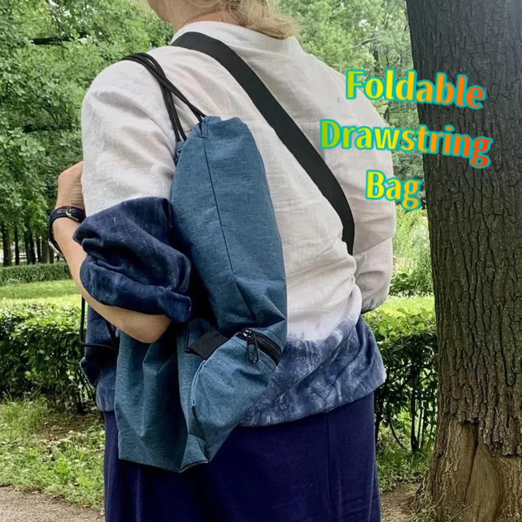 Foldable Drawstring Bag, Ultralight Outdoor Bag – a Stylish and Lightweight Backpack Suitable for Hiking, Sightseeing, and Everyday Use.