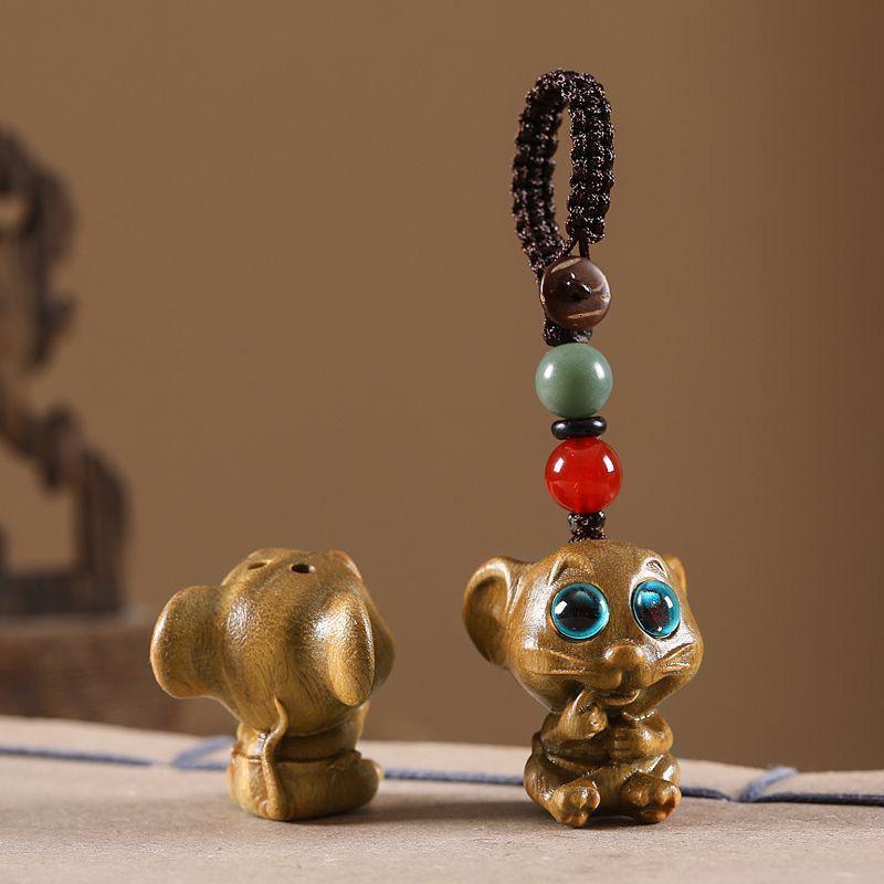 Twelve Zodiac Animal Charms Green Sandalwood Set: Rat, Ox, Tiger, Rabbit, Dragon, Snake, Horse, Sheep, Monkey, Rooster, Dog, Pig.