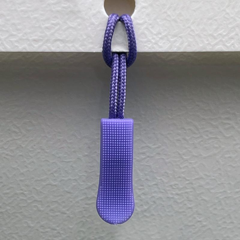 Available: Black Detachable Zipper Pull Lanyard with Silicone Rope.