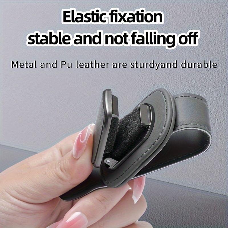 Heavy-duty PU leather car sun visor clip and eyewear holder—a one-click dashboard organizer compatible with smartphones.